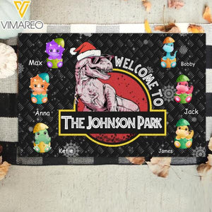 PERSONALIZED WELCOME TO THE PARK DINOSAUR CHRISTMAS DOORMAT TNDT2611